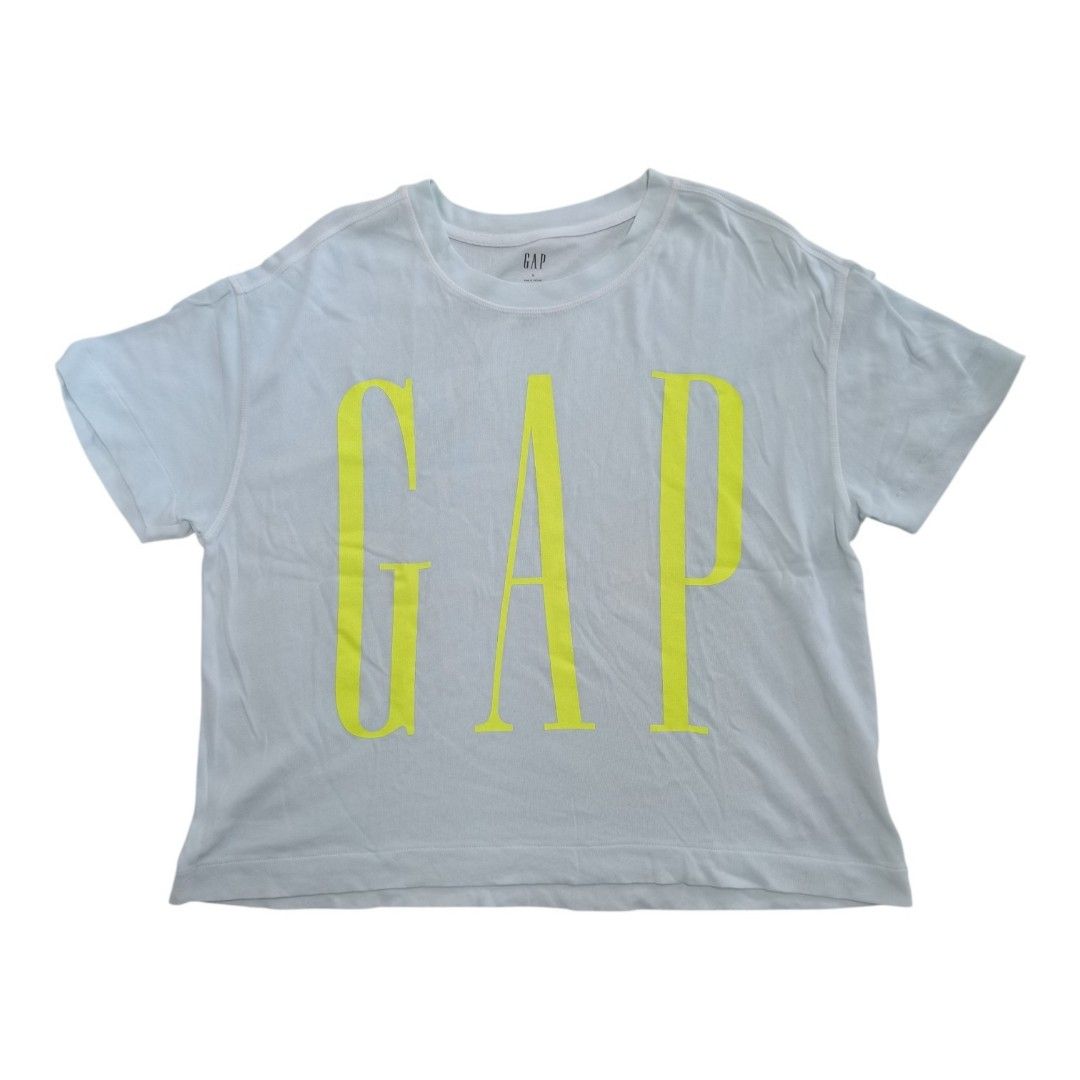 GAP short-sleeve graphic t-shirt. (Category: Shirts) located in Santa Cruz. Submitted by oddpenguin-4575 (Listing ID 1461523419, Image 1). Description: 📌.....P L E A S E R E A D..... 📌measurement:Laid flat Sh-20.5"/Sleeve-7"/Chest-17.5"/Lenght-23"/armhole-7"/armpit-8.5" 📌size:this shirt is a Filipino Women's Size Small (S), 📌color-10/10 📌Brand: GAP 📌Pattern/Style: Solid light mint green (or very pale blue/aqua) with a bold, oversized yellow
