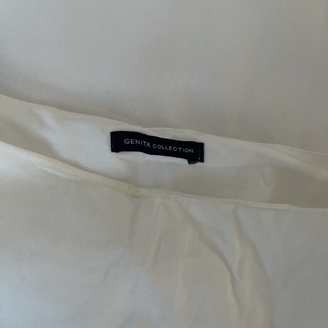 Genita Collection White Puff Sleeve Top (Category: Blouses) located in Muntinlupa City. Submitted by sza1123 (Listing ID 1461412294, Image 2). Description: - White top from Genita Collection - Features stylish puff sleeves - Relaxed fit for comfort - Curved hemline, longer at the back - Simple and versatile design - Easy to style for various occasions - Ideal for everyday wear.