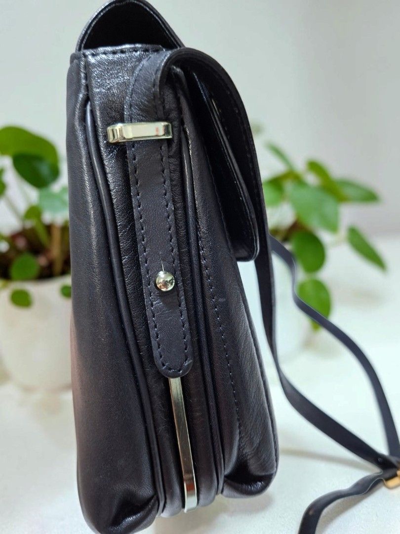 GENUINE LEATHER CROSSBODY SLING (Category: Cross-body Bags) located in Las Pinas. Submitted by annachiaonair2037 (Listing ID 1461460556, Image 3). Description: GENUINE LEATHER CROSSBODY SLING FROM JAPAN ADJUSTABLE STRAP INNER LEATHER LINING H 7.5" L 9.5" W 3" Disclaimer: I am not affiliated with, associated with, or authorized by any of the brands featured posted. Any mention of brand names, trademarks, or logos is solely for identification and r