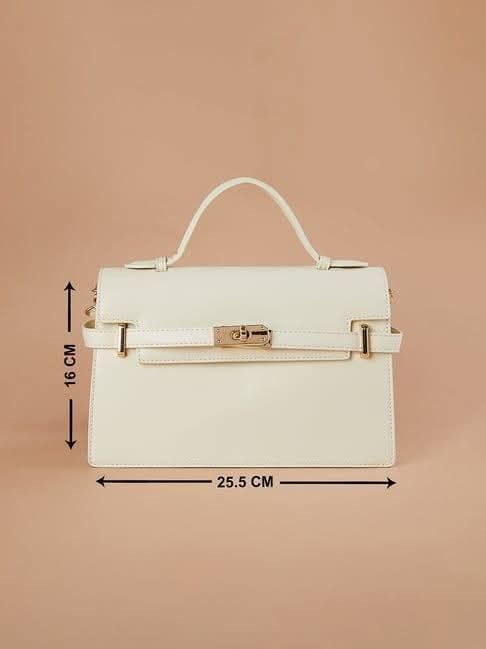 Ginger UAE brand white handbag with extra strap (Category: Shoulder Bags) located in Mandaluyong City. Submitted by splashfashion.ph (Listing ID 1461333380, Image 2). Description: .