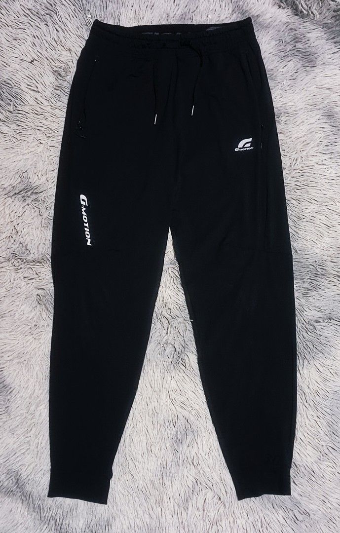 GIORDANO G-MOTION ACTIVE JOGGER PANTS (Category: Joggers) located in Davao. Submitted by nevar07 (Listing ID 1461560751, Image 1). Description: SIZE WAIST: 29-33 LENGTH: 38 W/ 3 ZIPPER TYPE POCKET REFLECTORIZE ELASTIC WAISTBAND PRODUCT FEATURES: - Cooling yarn fabric, cool to the touch - Four-way elastic, excellent stretchability and not easily deformed - Quick-drying function keeps you dry and comfortable. MATERIAL FABRIC: 78% NYLON, 22% ELASTIC
