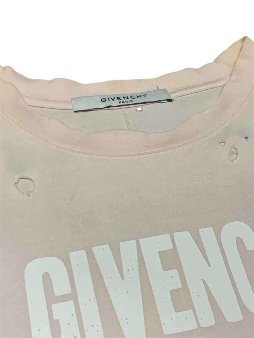 Givenchy Distressed (Category: Tshirts & Polo Shirts ) located in Manila. Submitted by lyf_7hrift (Listing ID 1460954435, Image 3). Description: Givenchy Distressed Shirt P250 29.5L 21W Dimes 9/10 Color Rate Good Condition.