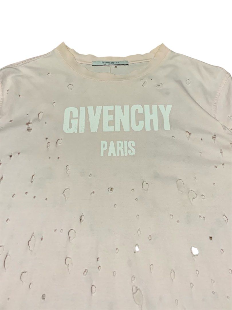 Givenchy Distressed (Category: Tshirts & Polo Shirts ) located in Manila. Submitted by lyf_7hrift (Listing ID 1460954435, Image 2). Description: Givenchy Distressed Shirt P250 29.5L 21W Dimes 9/10 Color Rate Good Condition.