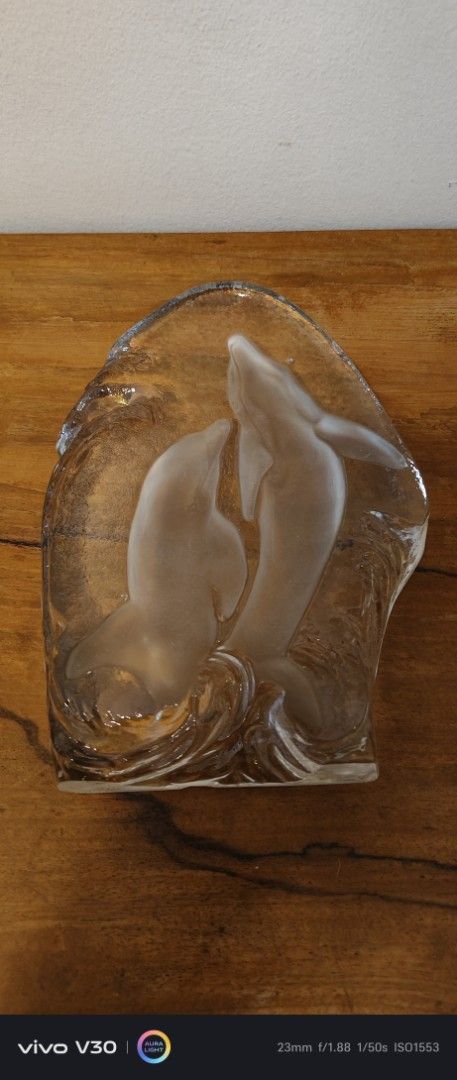 Glass Dolphin Sculpture with Waves (Category: Other Home Decor) located in Manila. Submitted by roblazo25 (Listing ID 1461379243, Image 2). Description: - Stunning clear glass sculpture - Features two playful dolphins in waves - Dolphins have a beautiful frosted finish - Ideal size for shelves or desks - Excellent decorative piece.