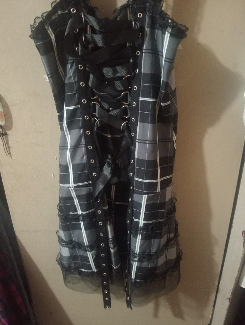 Goth Dark Plaid Dress (Category: Dresses) located in Makati City. Submitted by pokinana67 (Listing ID 1461458092, Image 2). Description: - Only used once - Black and grey plaid mini dress - Lace-up front detail - A line dress - Ruffled hemline - Perfect for gothic or punk aesthetics - Ideal for parties and events size s L : 62cm W : 32cm (?)?.