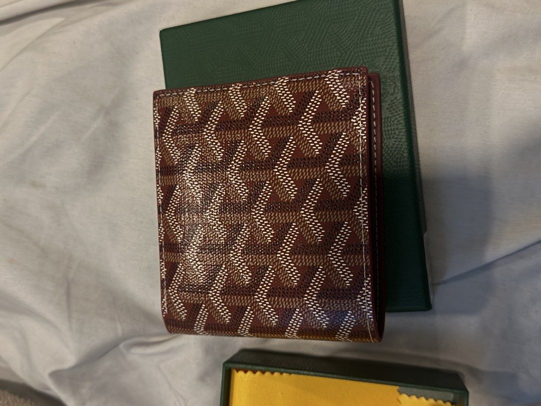 Goyard Bi-fold Wallet Brown Monogram (Category: Luxury Bags & Wallets) located in Manila. Submitted by epiccat_52eded (Listing ID 1461364998, Image 2). Description: - Authentic Goyard wallet - Classic brown monogram pattern - Bright yellow leather interior - Made in France - Includes original Goyard box and dust bag - Ideal for everyday use.