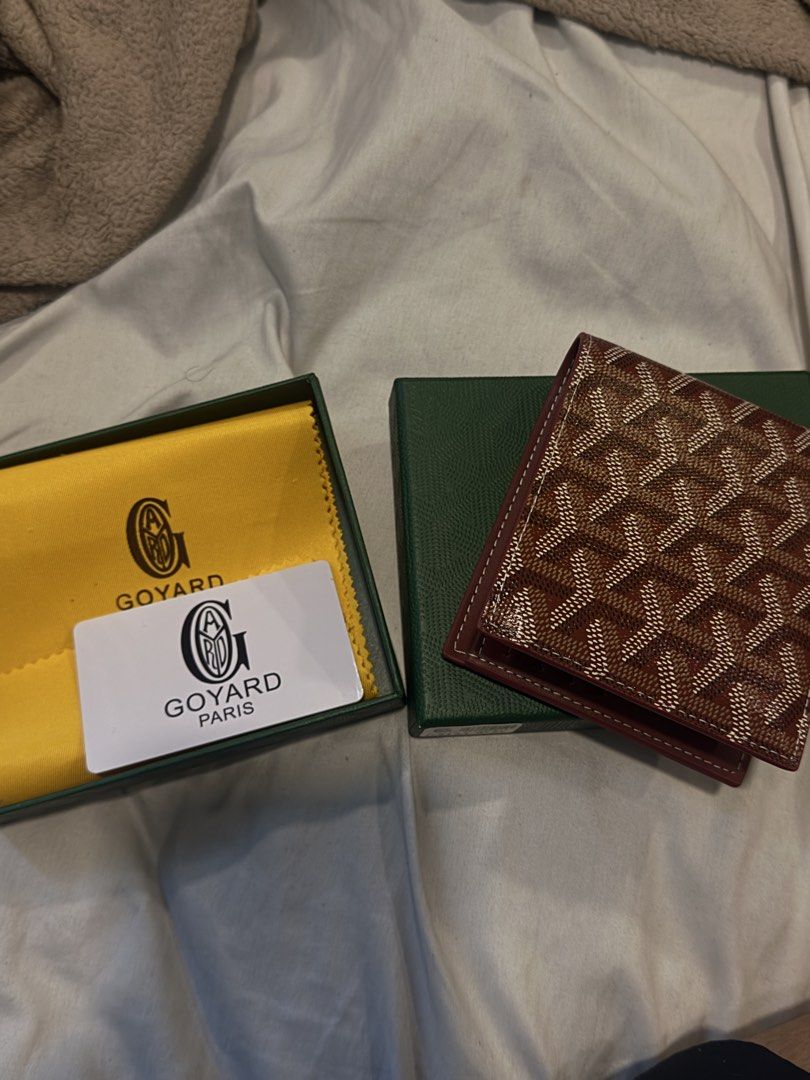 Goyard Bi-fold Wallet Brown Monogram (Category: Luxury Bags & Wallets) located in Manila. Submitted by epiccat_52eded (Listing ID 1461364998, Image 1). Description: - Authentic Goyard wallet - Classic brown monogram pattern - Bright yellow leather interior - Made in France - Includes original Goyard box and dust bag - Ideal for everyday use.