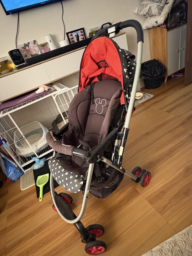 Graco Mickey Mouse stroller (Category: Strollers) located in Manila. Submitted by cbcollection_ (Listing ID 1461324876, Image 2). Description: - Adorable Mickey Mouse design - Reversible canopy with fun polka dots - Secure 5-point safety harness - Folds compactly for easy storage - Perfect for park strolls and errands - Minor wear on frame, fully functional.
