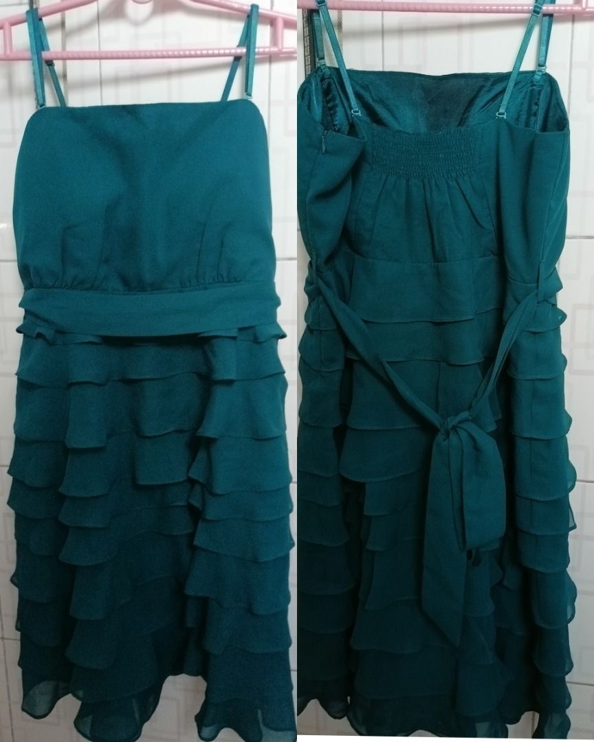 Green Sleevless Dress (Category: Dresses) located in Antipolo. Submitted by jocyong22 (Listing ID 1461462871, Image 1). Description: - Teal dress with all-over ruffles - Spaghetti straps - Tie at the back for adjustable fit - Ideal for parties and events - Size: Bust:36in Waist:35in Length:31in.