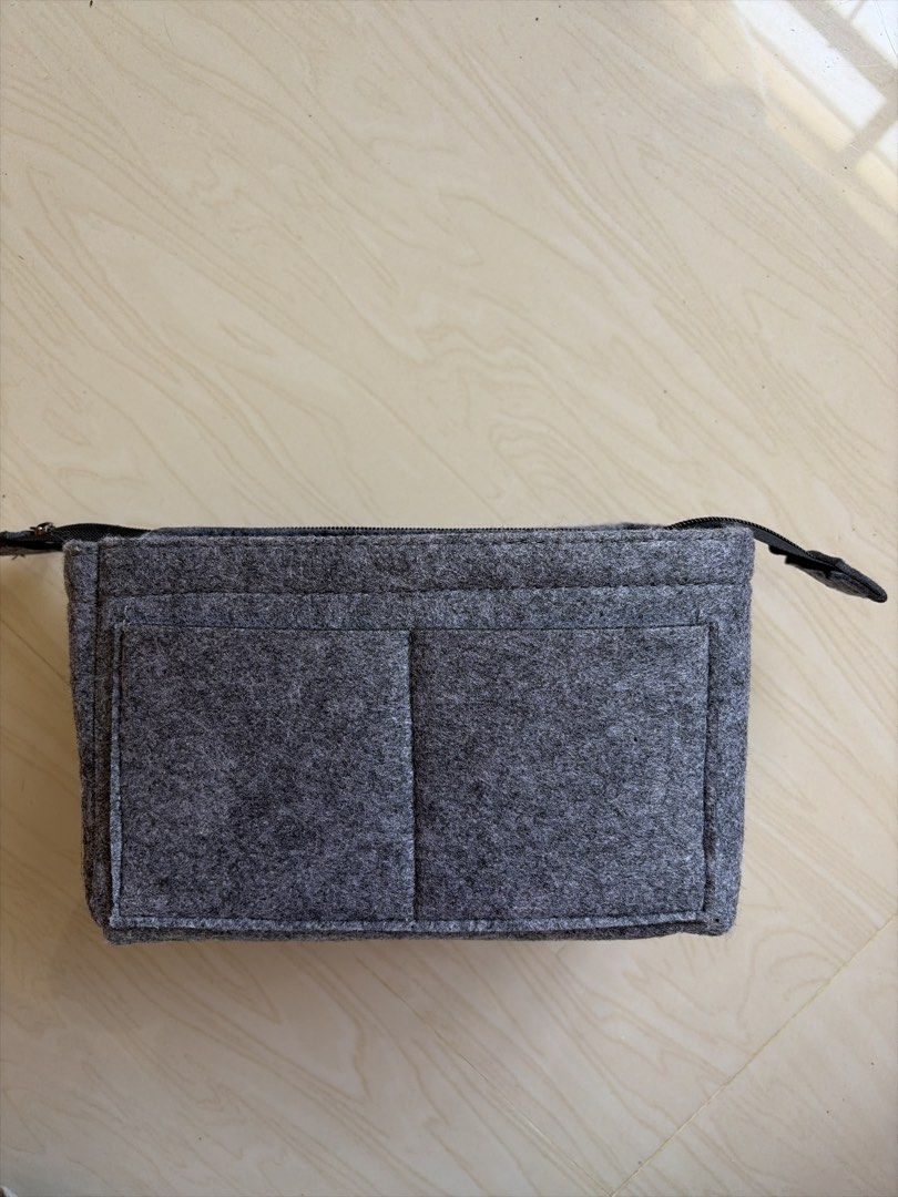 Grey Felt Bag Organizer Insert with Zipper Pockets (Category: Accessory Holder, Box & Organizers) located in Bulacan. Submitted by aarchive (Listing ID 1461351005, Image 1). Description: - Keep your large tote bags tidy and organized. - Features multiple interior pockets for easy storage of essentials. - Includes a main zippered compartment for added security. - Designed to fit perfectly in larger tote bags. - Ideal for everyday use and quick acc