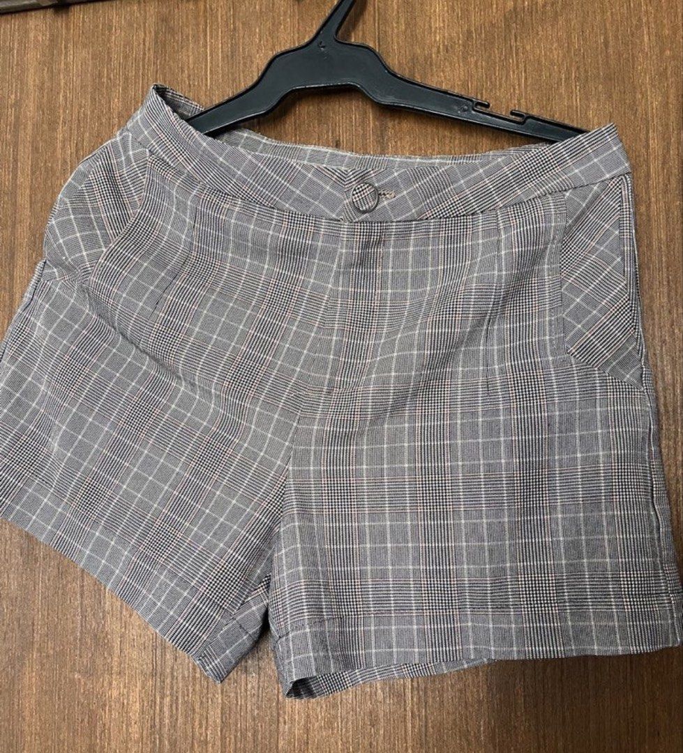 Grey Plaid High Waisted Shorts (Category: Shorts) located in Paranaque City. Submitted by richezlremo6165 (Listing ID 1461379560, Image 1). Description: - Grey plaid shorts - High-waisted style - Button closure at the front - Two front pockets - Two back pockets - Versatile for casual or dressed-up outfits.