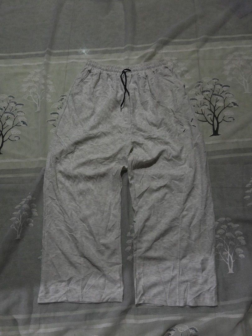 Grey Sweatpants with Drawstring (Category: Sleep and Loungewear) located in Lingayen. Submitted by rahzzelula73279 (Listing ID 1461528945, Image 1). Description: - Comfy grey sweatpants - Elastic waistband with drawstring - Loose fit - Cropped length - Ideal for lounging or casual wear - Simple, versatile design.