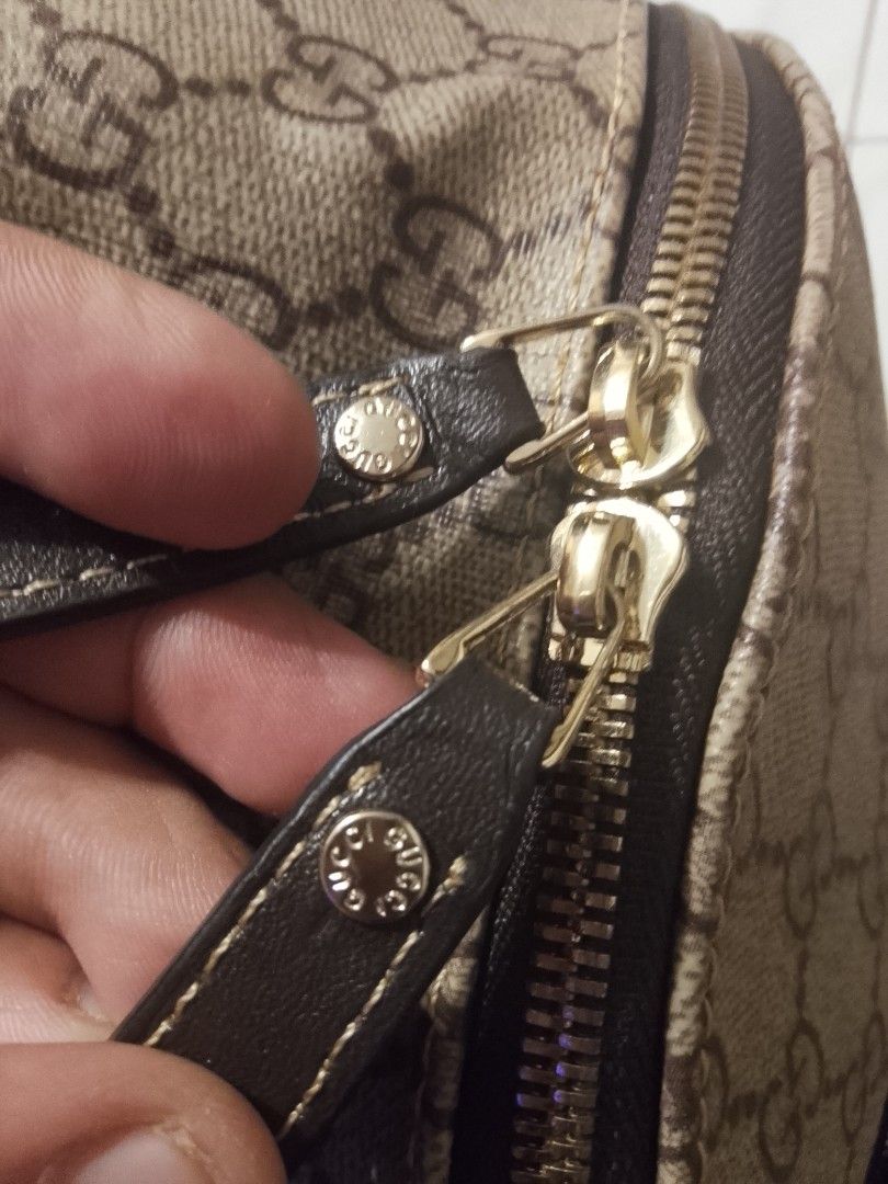 Gucci GG Monogram Backpack (Category: Luxury Bags & Wallets) located in Talisay. Submitted by southernthrifts (Listing ID 1461499930, Image 3). Description: - Iconic Gucci GG monogram pattern all over - Classic brown canvas with leather trim - Adjustable straps for comfortable wear - Convenient front zip pocket - Ideal for everyday use or travel.