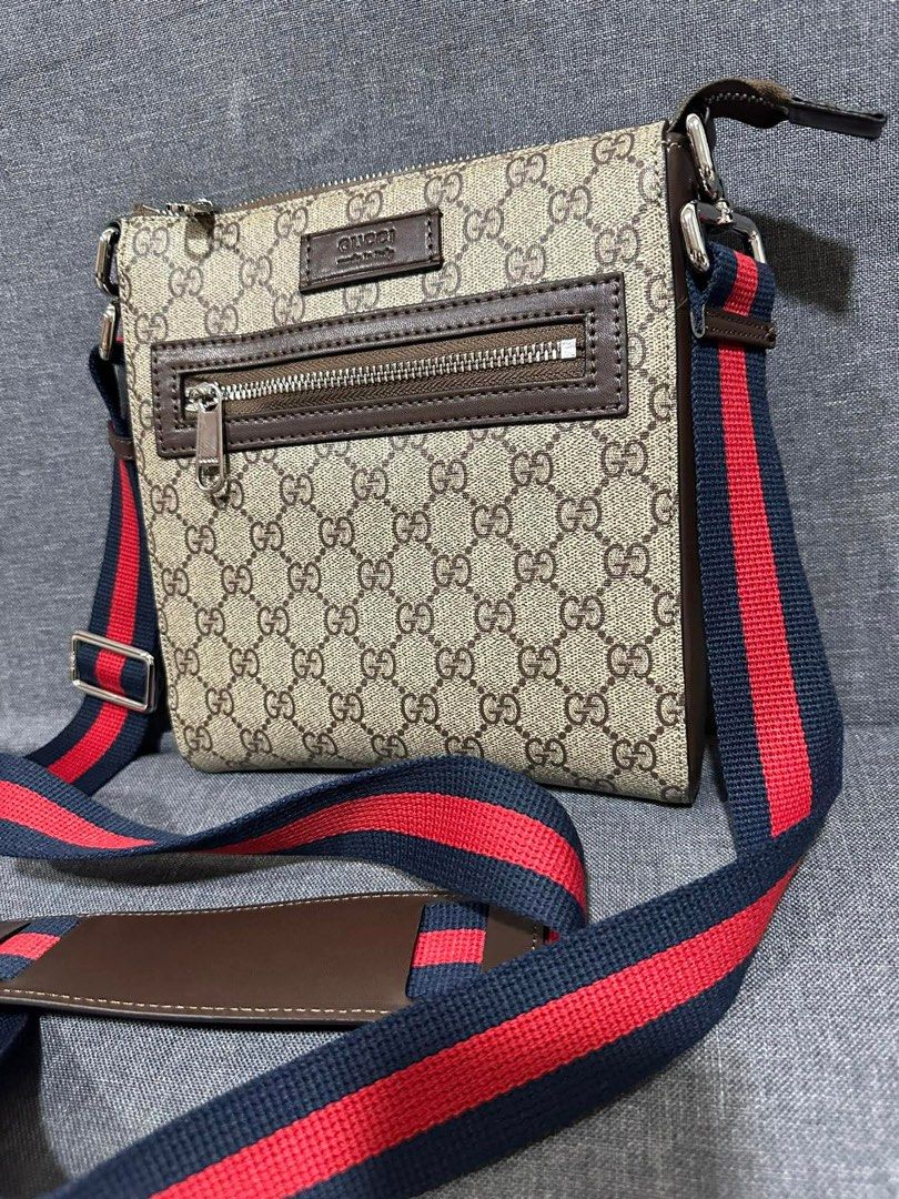 Gucci GG Monogram Canvas Crossbody Bag (Category: Luxury Bags & Wallets) located in Los Banos. Submitted by ukaynidizkie (Listing ID 1461423658, Image 2). Description: - Gucci crossbody bag - Classic GG monogram canvas - Brown leather trim - Signature red and blue stripe strap - Interior zip pocket - Interior slip pocket - Ideal for everyday use.