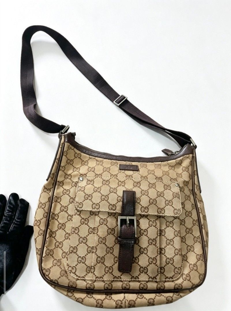 Gucci GG monogram canvas messenger/shoulder bag (Category: Activewear) located in Manila. Submitted by apparell (Listing ID 1461391236, Image 2). Description: Gucci GG monogram canvas messenger/shoulder bag GUARANTEED AUTHENTIC ISSUE MINIMAL FLAW.