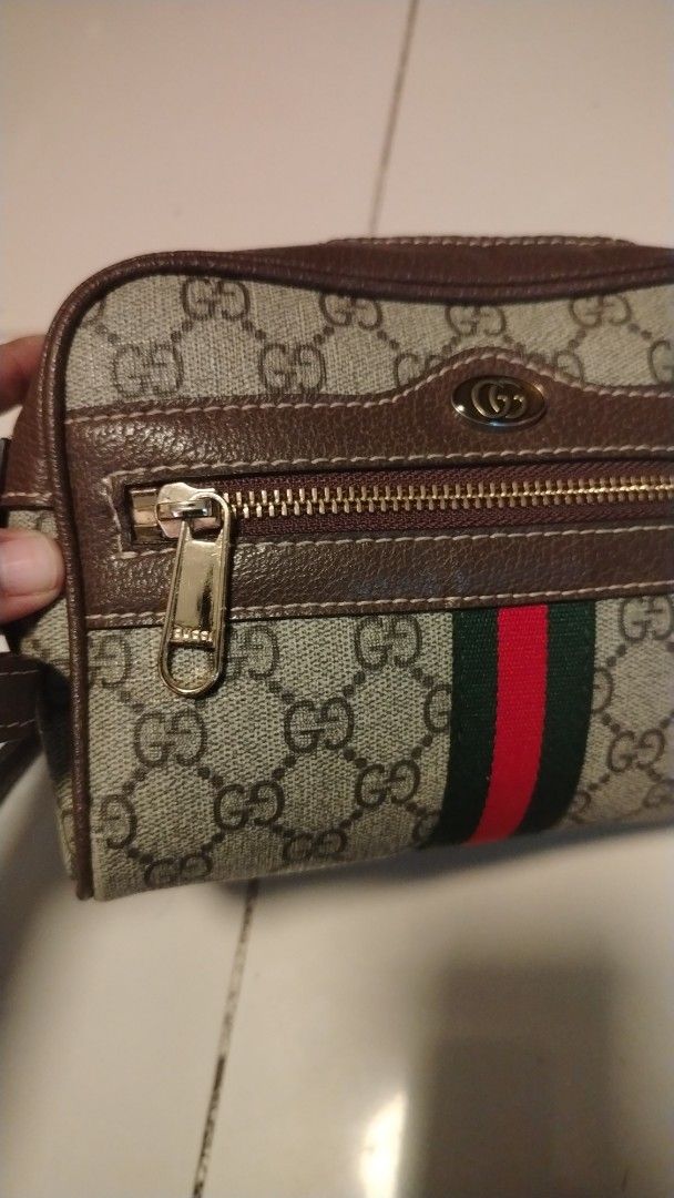 Gucci Monogram Canvas & Leather Web Stripe Crossbody Bag (Category: Luxury Bags & Wallets) located in Manila. Submitted by wildwind_73f77a (Listing ID 1461491930, Image 2). Description: - Gucci crossbody bag - Classic GG monogram canvas with brown leather trim - Iconic green and red web stripe detail - Zipper closure for main compartment - Front zip pocket - Adjustable strap - Ideal for everyday use.