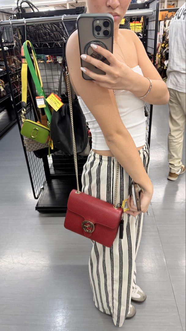 Gucci Red Leather Interlocking Bag (Category: Luxury Bags & Wallets) located in Quezon City. Submitted by thirtyfinds (Listing ID 1457137775, Image 2). Description: 💯 Authentic - Gold Chain Strap - Iconic GG Logo on Front - Versatile for Everyday or Going Out.