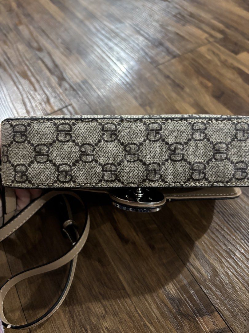 Gucci sling bag (Category: Cross-body Bags) located in Trece Martires City. Submitted by mlmendoza16 (Listing ID 1461332800, Image 3). Description: Gucci bag Good as new Color mocca brown Size small Adjustable strap.