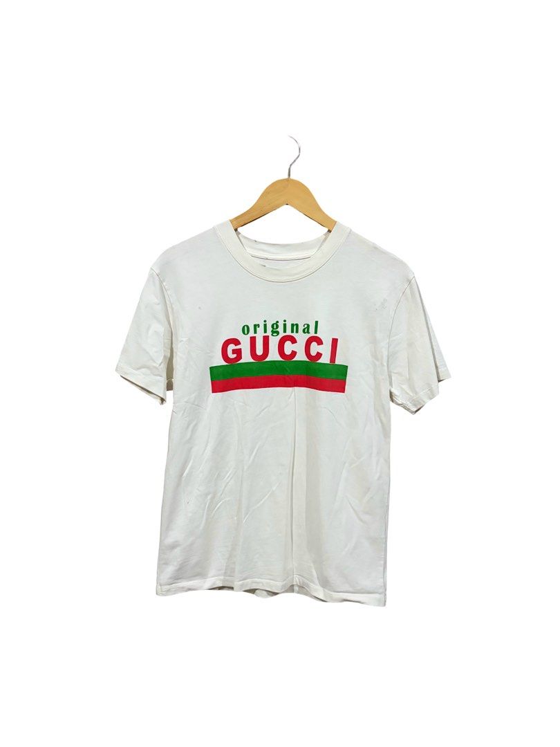 Gucci Web Accent T-Shirt (Category: Shirts) located in Calasiao. Submitted by used_goodies222 (Listing ID 1461332216, Image 1). Description: 20.5*27 No neck tag Good Condition.