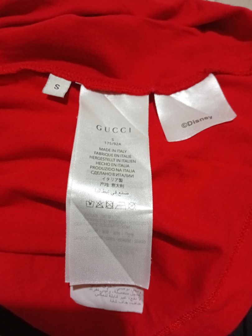 Gucci x Disney T-shirt (Category: Tshirts & Polo Shirts ) located in Iloilo. Submitted by luckytiger.c90343 (Listing ID 1461408010, Image 3). Description: - Authentic Gucci T-shirt featuring a fun Disney character graphic. - Stylish color block design in red, green, and black. - Made in Italy for premium quality. - Size S, perfect for a snug fit. - A must-have for any Gucci and Disney enthusiast!.