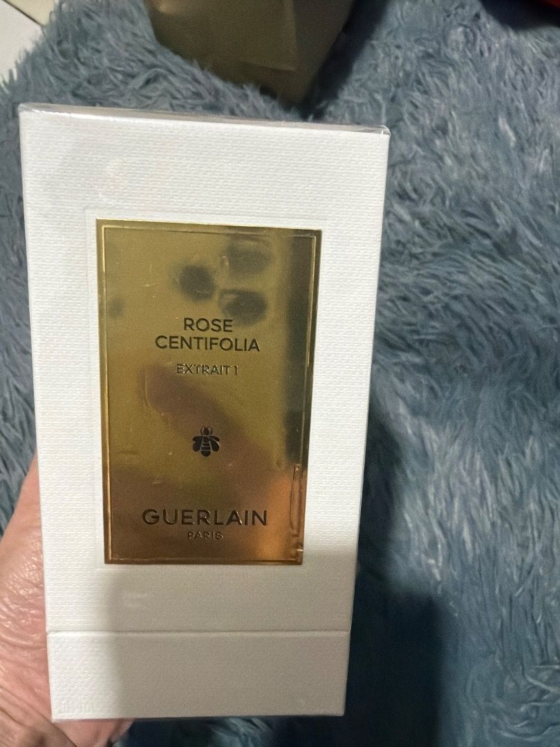 Guerlain Rose Centifolia Extrait 1 Perfume (Category: Fragrance & Deodorants) located in Caloocan City. Submitted by dragongirl0923 (Listing ID 1461522738, Image 1). Description: - Guerlain Rose Centifolia Extrait (1ml) - Comes in original packaging - Features the iconic Guerlain bee emblem - A luxurious fragrance suitable for any occasion - Makes a great gift idea.