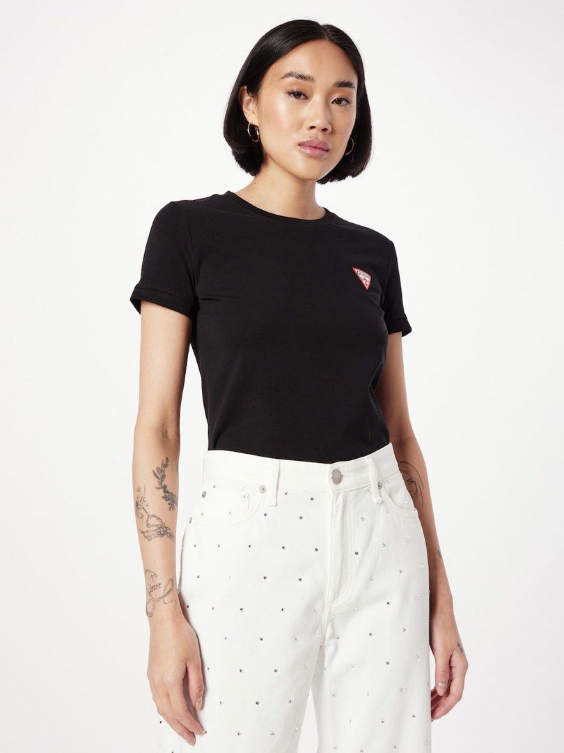 Guess Basic Top (Cream & Navy Blue) (Category: Shirts) located in Binan City. Submitted by chelsea05855 (Listing ID 1461371305, Image 2). Description: - Guess Basic top - Colors: 1 Cream and 1 Navy Blue (Both size XL) - Features the iconic Guess triangle logo on each shirt - Ideal for casual and everyday outfits - Brandnew with original tags attached (mall pull out items) -350 each (300 each if take both) -Model photo used for sample or reference