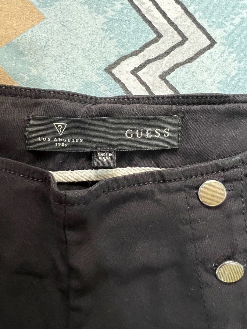 Guess Black High-Waisted Button Front Shorts (Category: Shorts) located in Caloocan City. Submitted by allotherthings26 (Listing ID 1461561636, Image 3). Description: - Guess black high-waisted shorts - Features gold-toned button-front detail - Plain back design - Perfect for dressing up or down - Comfortable fit.