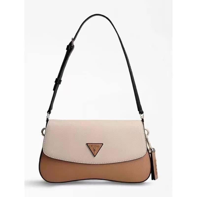 Guess Shoulder Bag - Multiple Colors Available (Category: Shoulder Bags) located in Taytay. Submitted by pureriver.ef6f49 (Listing ID 1461557760, Image 2). Description: Stylish Guess shoulder bags in black, white, brown, and monogram. Fits daily essentials. Features Guess logo and adjustable sling and shoulder strap All colors onhand Loc Cainta Rizal Shop now!.