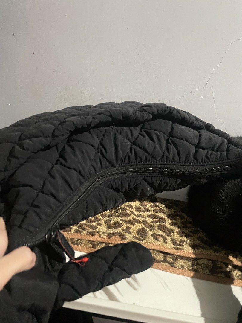 Guilted Nylon Sling Bag (Category: Sling Bags) located in Antipolo. Submitted by lilhermes (Listing ID 1461335435, Image 3). Description: In good condition Fit 13 inches .