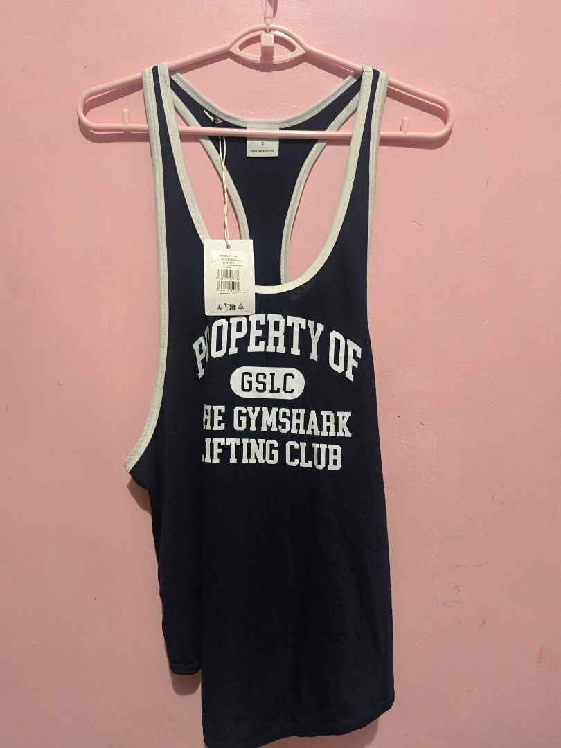 Gymshark Property of Stringer (Category: Activewear) located in Gumaca. Submitted by badzmdfghjkl (Listing ID 1461504229, Image 1). Description: BRAND NEW no plastic tag still intact small size navy ang kulay niya rfs; di trip mag stringer.