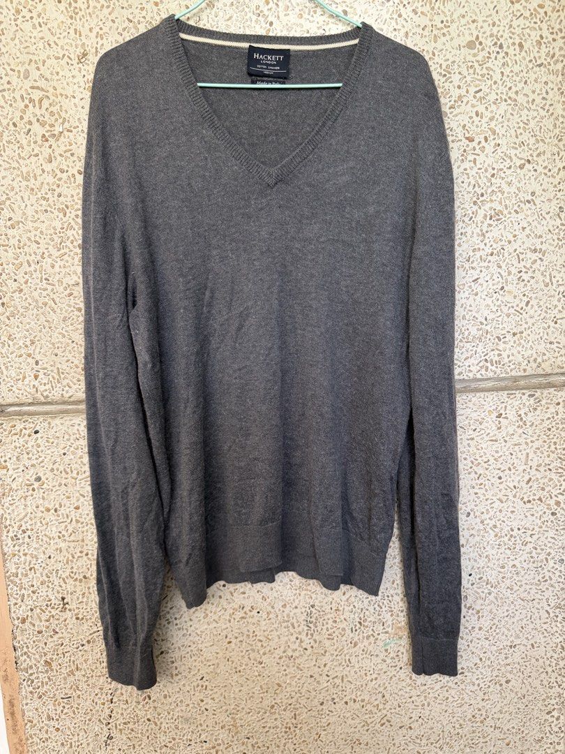 Hackett Grey V-Neck Sweater with Suede Elbow Patches (Category: Coats, Jackets and Outerwear) located in Candon. Submitted by dhinlei07 (Listing ID 1461361020, Image 1). Description: - Brand: Hackett - Color: Grey - Neckline: V-neck - Sleeves: Long sleeves - Details: Suede elbow patches - Style: Classic, simple, versatile - Comfort: Comfortable knit - Occasion: Great for layering or wearing on its own - Wardrobe essential.