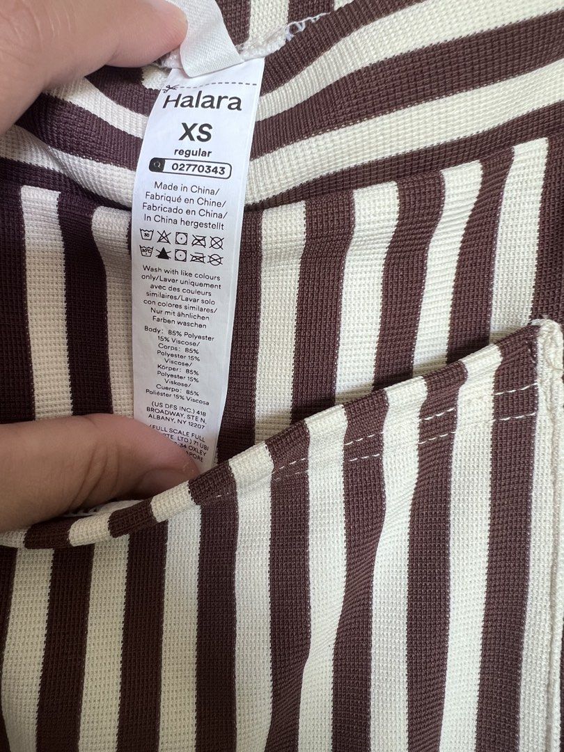 Halara Striped Jumpsuit XS (Category: Jumpsuits) located in Pulilan. Submitted by chibimoon81 (Listing ID 1461406155, Image 3). Description: - Halara brown and white striped jumpsuit - Size XS - Ribbed fabric - Functional pockets - Adjustable straps - Ideal for casual wear - Versatile for layering with a t-shirt.