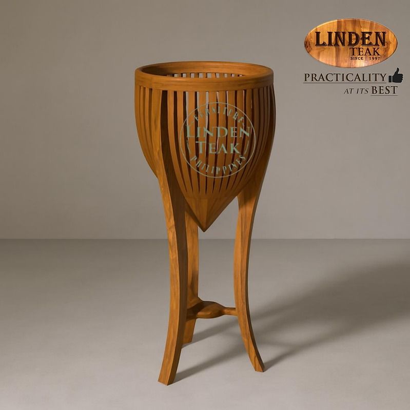 Handcrafted Solid Teak Wood Plant Stand Medium (Category: Other Home Furniture) located in Quezon City. Submitted by irishbuce601386 (Listing ID 1461352692, Image 1). Description: ITEM: Handcrafted Solid Teak Wood Plant Stand Medium Furniture SERIES: Gold Teak (Indoor Series) MAIN MATERIAL: Teak Wood (Tectona Grandis) FINISHING: N. Cellulose APPROXIMATE DIMENSIONS: 33 x 33 x 70cm (size may slightly vary due to its handcrafted nature) PACKAGING: S
