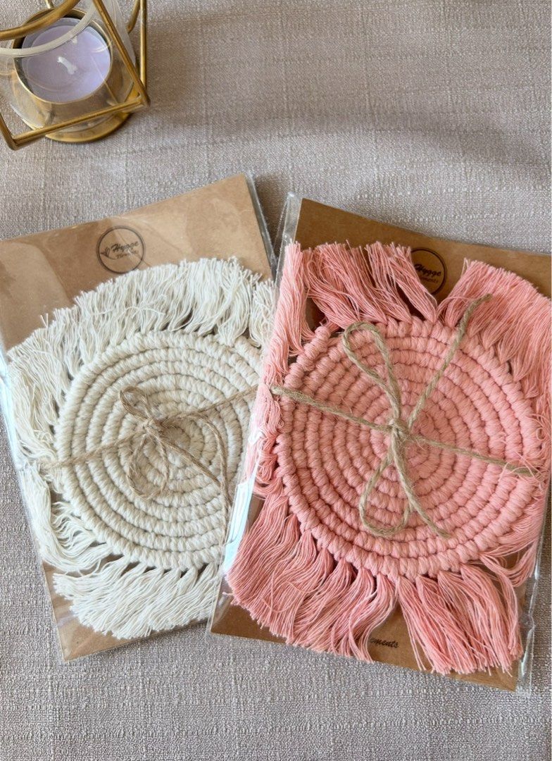 Handmade Macrame Coaster (Category: Dinnerware & Cutlery) located in Quezon City. Submitted by hygge.elements (Listing ID 1461414114, Image 1). Description: - Handmade macrame coaster - Available colors: Cream, Pink, Teal, Brown with Golden Yellow - Intricately woven with a fringed edge - Perfect for protecting surfaces and adding a bohemian touch to home decor Php 140 per piece Php 250 for 2pcs..