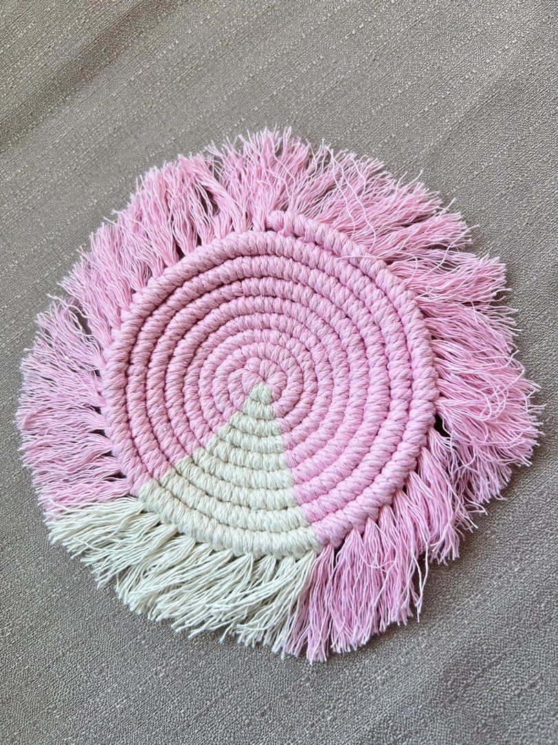 Handmade Macrame Coaster (Category: Dinnerware & Cutlery) located in Quezon City. Submitted by hygge.elements (Listing ID 1461414114, Image 3). Description: - Handmade macrame coaster - Available colors: Cream, Pink, Teal, Brown with Golden Yellow - Intricately woven with a fringed edge - Perfect for protecting surfaces and adding a bohemian touch to home decor Php 140 per piece Php 250 for 2pcs..