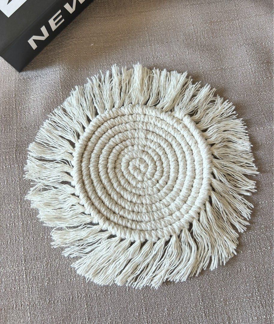 Handmade Macrame Coaster (Category: Dinnerware & Cutlery) located in Quezon City. Submitted by hygge.elements (Listing ID 1461414114, Image 2). Description: - Handmade macrame coaster - Available colors: Cream, Pink, Teal, Brown with Golden Yellow - Intricately woven with a fringed edge - Perfect for protecting surfaces and adding a bohemian touch to home decor Php 140 per piece Php 250 for 2pcs..