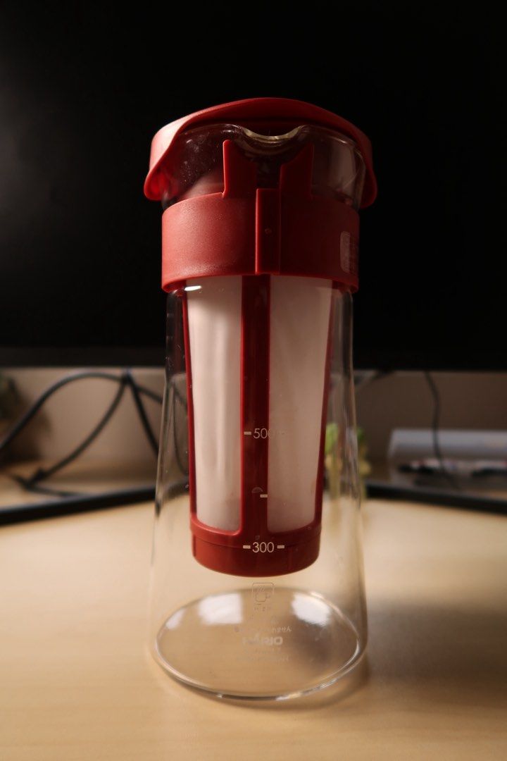 Hario Cold Brew Coffee Maker Red (Category: Coffee Machines & Makers) located in Pasig City. Submitted by dcvirata (Listing ID 1461373860, Image 3). Description: - Original Hario Cold Brew Coffee Maker Pitcher - Free plastic Hario V60 and filters - Durable glass carafe with integrated filter basket - Made in Japan - Has some minor flaws including water marks and a small stain.