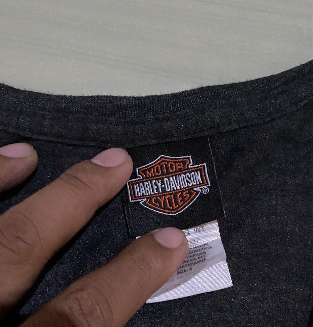 Harley-Davidson 110th Anniversary T-Shirt (Category: Shirts) located in San Carlos City. Submitted by roseee_012 (Listing ID 1461470137, Image 3). Description: - Grey Harley-Davidson T-Shirt - Features 110th Anniversary Graphic - Red Gas Tank Design - Text: '110 years of great motorcycles' - Material: Cotton Blend - Ideal for Harley-Davidson Enthusiasts.