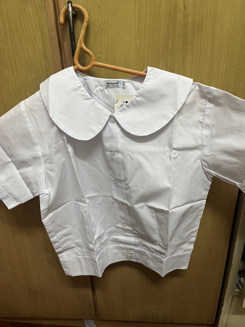 Henson School Collar Shirt Uniform Elementary (Category: Others Tops) located in Manila. Submitted by cccuyyy (Listing ID 1461406082, Image 3). Description: - Henson brand white school uniform shirt - Features a classic Peter Pan collar - Short sleeves for comfort - Size 16 - Brand new with original tag still attached - Ideal for school wear .