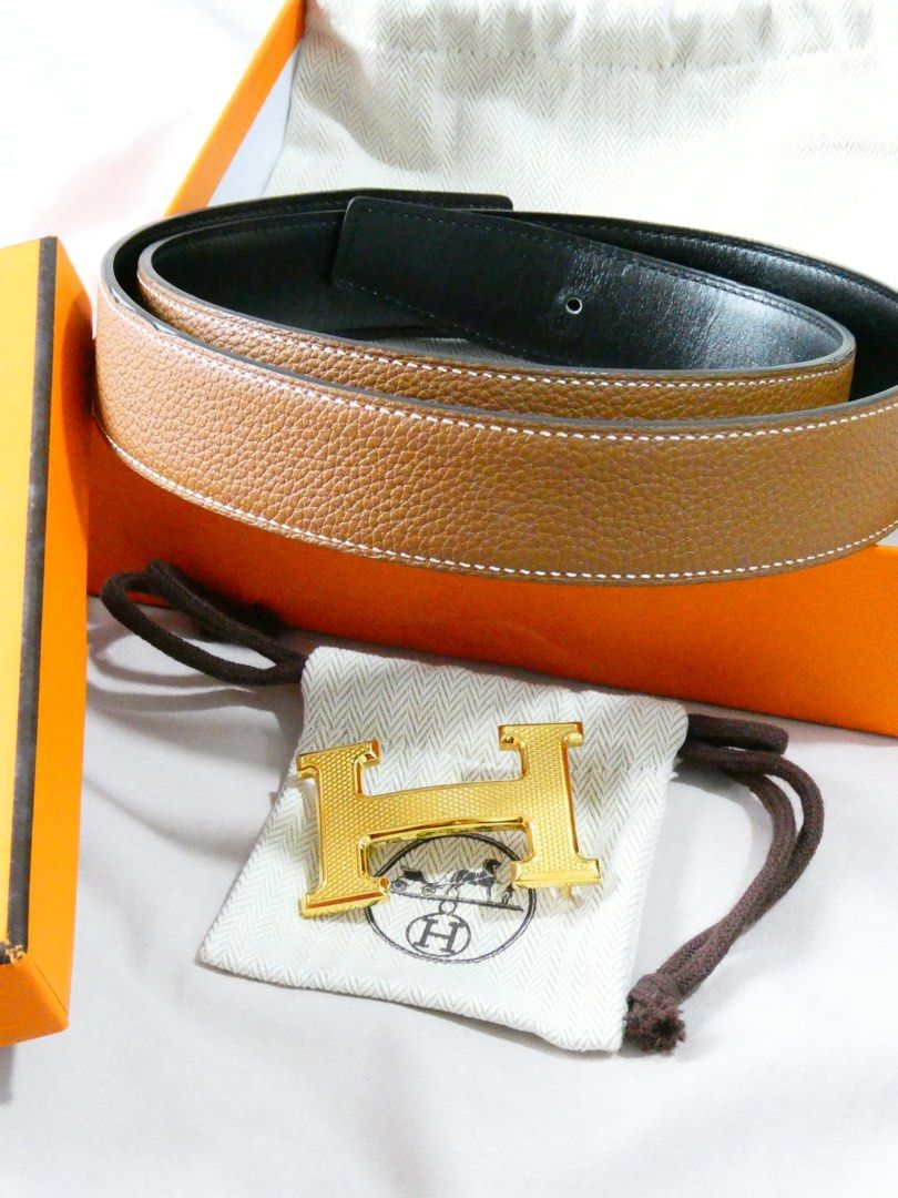 Hermes Belt with Gold H Buckle (Category: Belts) located in Quezon City. Submitted by shopwithfrance (Listing ID 1461550544, Image 1). Description: - Authentic Hermes belt - Guilloche - Comes Complete - reversible black and gold - size 85.