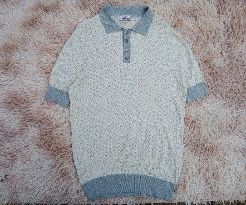Hermes Knit Polo Shirt (Category: Tshirts & Polo Shirts ) located in Boston. Submitted by johnpaulvi30029 (Listing ID 1461396387, Image 2). Description: - Hermes knit polo shirt - Color: Cream with grey collar and cuffs - Design: Diamond pattern knit - Features: Three-button placket - Style: Great for casual wear or layering - Fit: Looks good on.