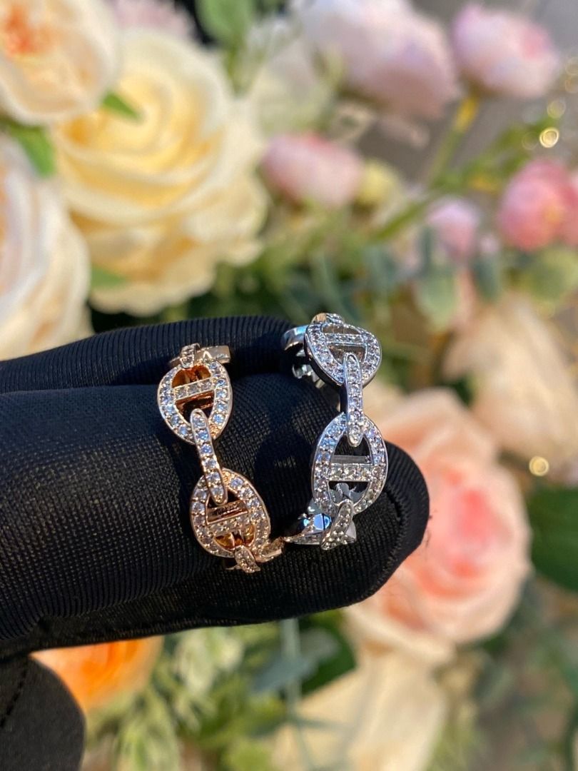 Hermes Rose Gold & Silver Diamond Ring (Category: Rings) located in San Juan City. Submitted by zenocean-f9dfa7 (Listing ID 1461438540, Image 2). Description: - Authentic Hermes design - Classic chain link style - Available in Rose Gold and Silver - Adorned with genuine diamonds - Adds a touch of luxury and sparkle to any look - Ideal as a special gift.