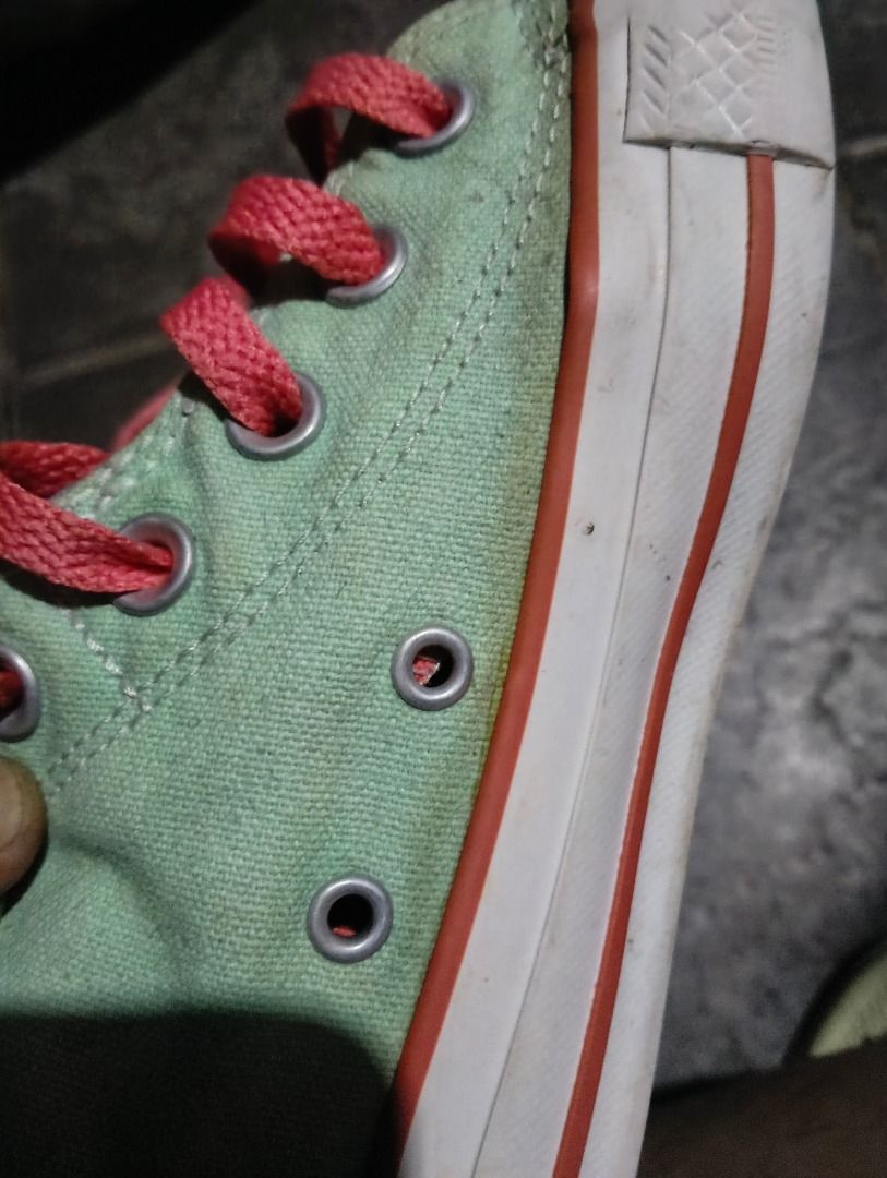 High Cut Shoes (Category: Sneakers) located in Antipolo. Submitted by jocyong22 (Listing ID 1461463216, Image 3). Description: - Cool Converse high tops - Mint green with purple and pink accents - Lace-up style - Fold-down tongue reveals purple lining - Minor scuffs on soles and toe cap from normal wear - Plenty of life left -US &.