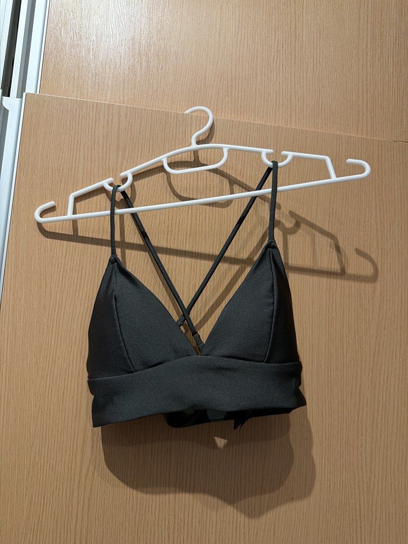 H&M Black Strappy Swim Top (Category: Bikinis & Swimsuits) located in Taguig. Submitted by gabgabie (Listing ID 1461488862, Image 1). Description: - Black bralette from H&M - Features a trendy criss-cross strap design at the front - Comfortable and stylish, ideal for layering or wearing on its own - Material: Polyamide and elastane.