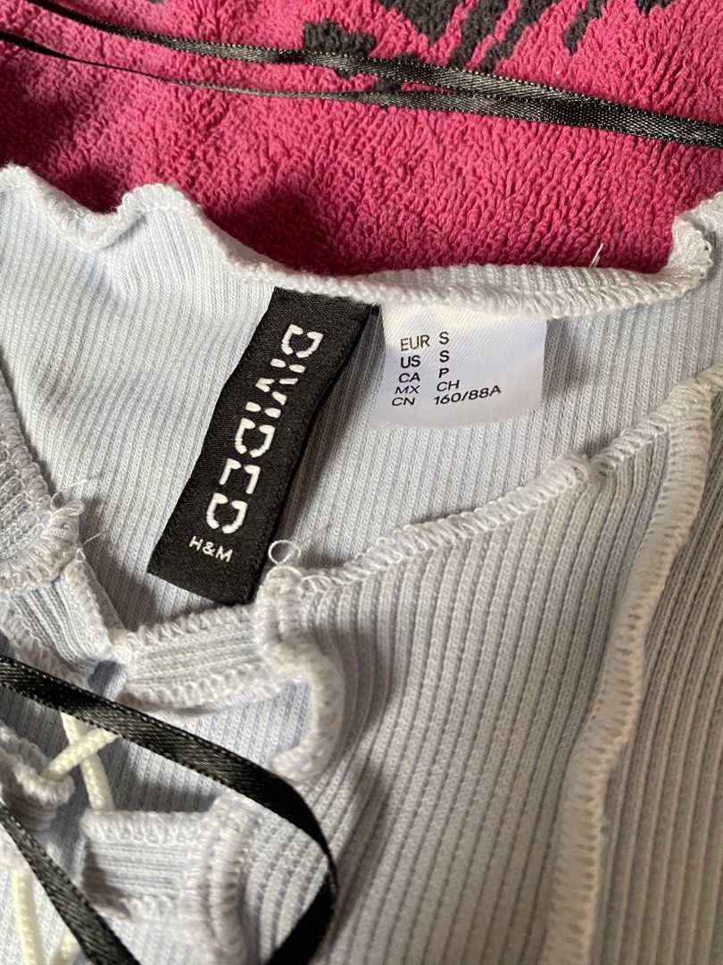 H&M Divided Pale Blue Tie Up Top (Category: Others Tops) located in Cavite. Submitted by keshlcy (Listing ID 1461343178, Image 3). Description: size: xs - s used once only perfect for spicy outfits👌🏻💯 pm for WW .