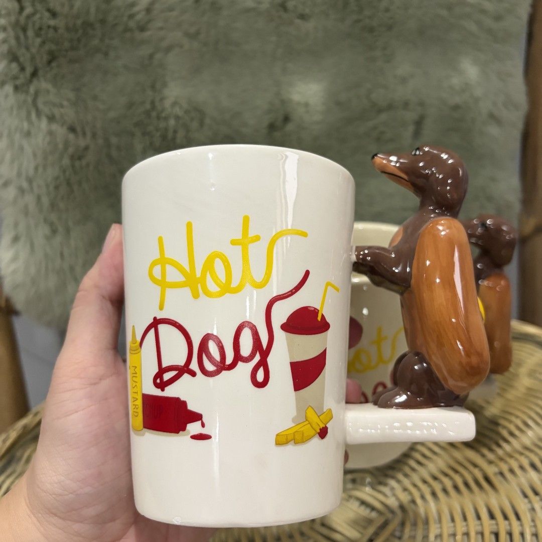 Hotdog Coffee Mug with Dog Handle (Category: Coffee & Tea Tableware) located in Pateros City. Submitted by lovealy_07 (Listing ID 1461508461, Image 2). Description: Brand New Super cute 10/10 Lalamove only php 280 each no issue.