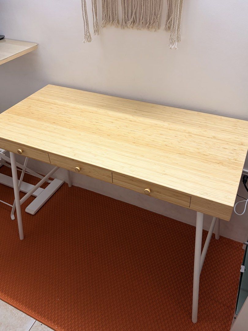 Ikea bamboo desk (Category: Office Furniture & Fixtures) located in Pasay City. Submitted by chard_ (Listing ID 1461324939, Image 1). Description: RFS: Too big for my small apartment. Original price: 8,000 Selling price: 4,500.