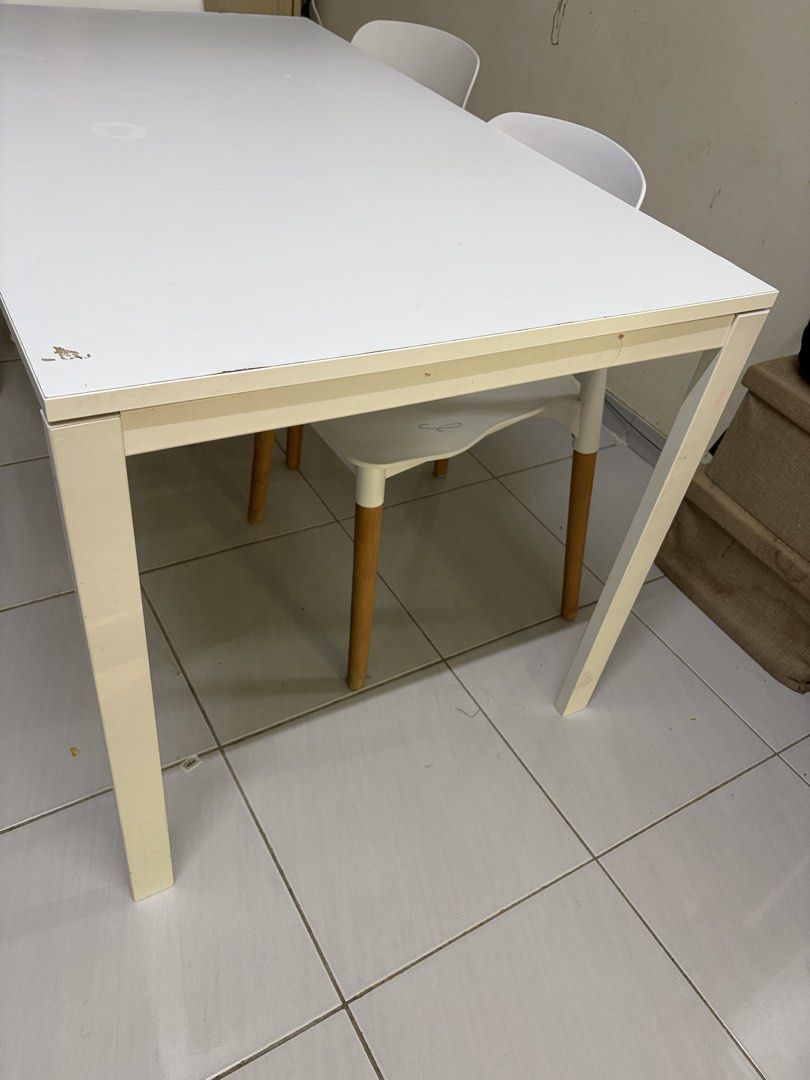 Ikea White Dining Table (Category: Tables & Sets) located in Selayang. Submitted by dania_shop912 (Listing ID 1461339921, Image 3). Description: - Ikea White dining table - Comfortably seats 4 people - Ideal for small apartments or dining areas - Shows minor scuffs on edges (sold as is).