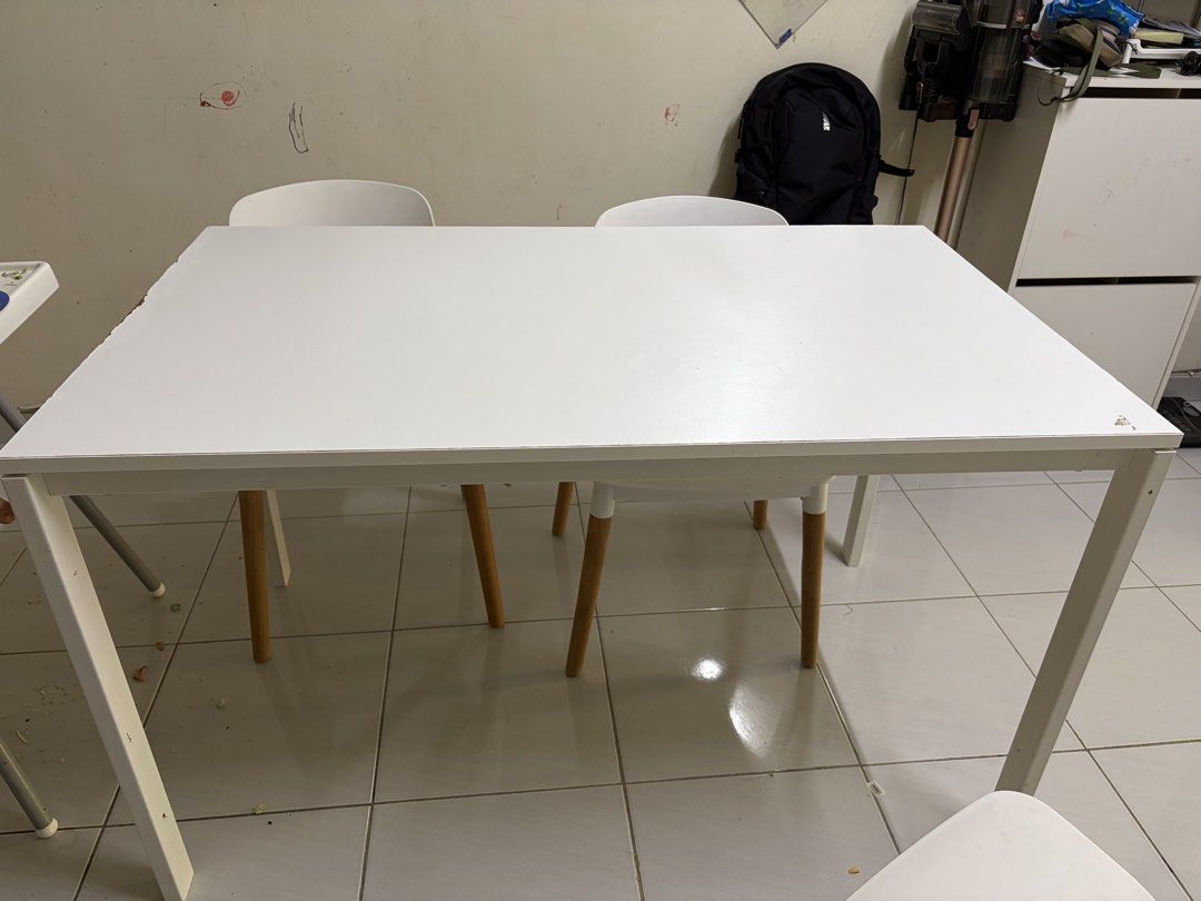 Ikea White Dining Table (Category: Tables & Sets) located in Selayang. Submitted by dania_shop912 (Listing ID 1461339921, Image 2). Description: - Ikea White dining table - Comfortably seats 4 people - Ideal for small apartments or dining areas - Shows minor scuffs on edges (sold as is).