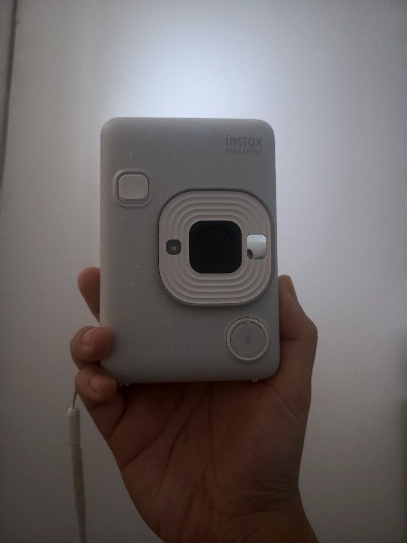 Instax Mini LiPlay (Category: Cameras) located in Antipolo. Submitted by haru0223 (Listing ID 1461379778, Image 2). Description: Female owner Inclusions: - Unit with battery and lace - charger (wire only) Meet-up : Antipolo simbahan or SM Megamall Grab or Lalamove: SF shouldered by the buyer.